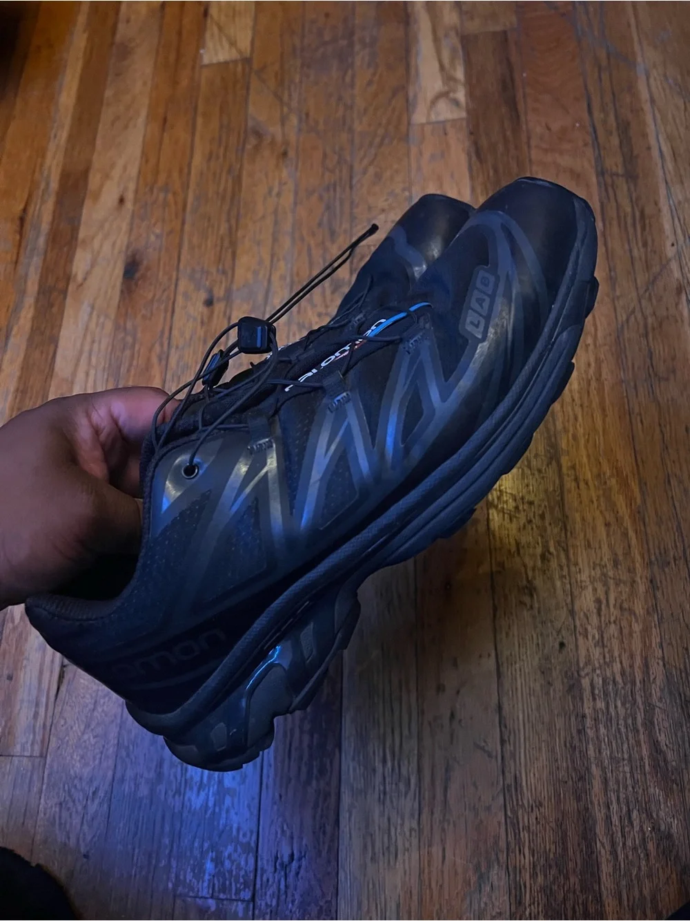 Salomon Black Trail Running Shoes with Blue Accents